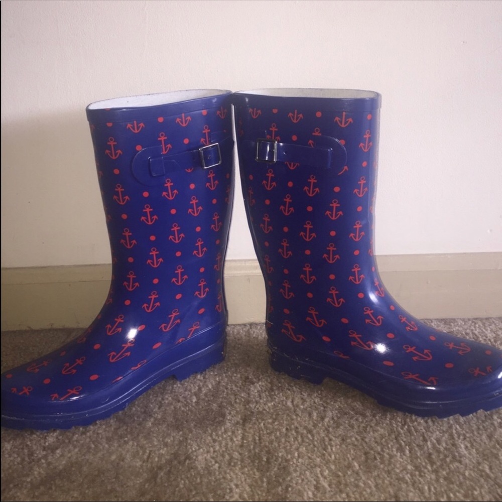 Blue rain boots with red anchors